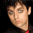 Animated contact sheet of Green Day band members with red text and repeated visual elements across frames.