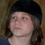 A person with long brown hair and a black beanie appears in two ; the right displays 'Love you Babe' text over a black and white graphic