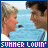 Animated sequence of two people in profile facing each other against a blue water background with text "SUMMER LOVIN'" at the bottom.