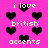 Pixelated pink background with black heart shapes and white text reading 'i love', 'british', and 'accents' in a repeating pattern.