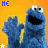 A 3x3 contact sheet of Cookie Monster frames with yellow background, blue text, and white stars showing sequential animation changes in hand position and mouth shape.