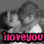 A grayscale anime-style image of two figures in an embrace, with text 'i love you' displayed below in six different colors across a