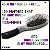 A pixelated static image shows a dark, elongated object resembling a spoon or ladle with a rounded bowl and narrow handle against a white background with scattered colored pixels.