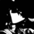 Pixelated white shape resembling a flag or sail on black background with scattered light pixels.