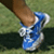A 4-frame contact sheet of an animated running shoe icon with text overlays, showing a blue athletic shoe on grass in the top-left frame and alternating red/blue text across frames.