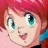 Pixelated close-up of a cartoon character with red hair, green eyes, and a smiling expression against a pink background.