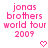 Pixelated pink text reads 'jonas brothers world tour 2009' with a small heart symbol below, displayed in two identical side-by-side on white background