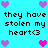Pixelated cyan background with repeated text and heart symbols in purple/pink hues.