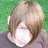 A pixelated image of a person with light brown hair against a green background, with green text reading "I love emo boys" on a black field.