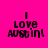 Four square display "I Love Austin!" text in black pixelated font on solid backgrounds: magenta, coral, yellow, and peach