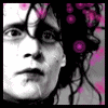 A split- image with a grayscale portrait on the left and pixelated text on the right