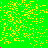 A static image composed of yellow pixel clusters on a bright green background, with scattered small pink and orange pixels at the corners.