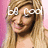 A blonde woman with long hair smiles against a pink background, overlaid with changing white text in pixelated font.