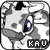 Pixelated grayscale image of a stylized character with purple accents, featuring large eyes and the text 'KAU' at bottom right.