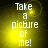 Four identical display white pixelated text 'Take a picture of me!' on a yellow gradient background with a circular light effect