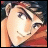 Pixelated anime-style character face with light skin and brown hair, next to stylized text on a black background.