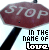 A stop sign with 'IN THE NAME OF love' text below, animated to cycle through color variations of the word 'love'.