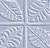 Static pixelated image divided into four quadrants by light gray lines, each quadrant containing abstract geometric patterns in varying shades of blue and white.