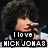 Six- of a person with curly hair in various poses and text overlays including 'I love NICK JONAS more than you', 'so put it in a juice box', 'and suck it', and 'ha ha'