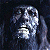 Pixelated static image of a stylized animal face with large eyes and a wide mouth against a dark background.