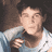 Static 48x48 pixel icon of a person with dark hair wearing light blue and white clothing, rendered in low-resolution pixel art style with visible dithering and color blending.