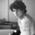 Black-and-white photo of a person with curly hair in a room, paired with red pixelated text on black background reading "Nick and Keley It will Hopped... Someday x3".