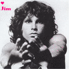 Black-and-white photo of a person with curly hair holding a microphone, pink text 'Jim' and heart symbol in top-left corner.
