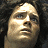 A 48x48 pixel buddy icon featuring a split composition with a character's face on the left and