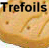 Static buddy icon featuring a golden-brown cookie with visible texture and the word "Trefoils" in bold black text above it on a light background.