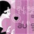 Pixelated image of a person with black hair and white clothing against a pink background with partial text elements.