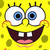 Yellow cartoon character with large white eyes, blue pupils, and black eyelashes; wide open mouth showing two square teeth and pink tongue; green spots on yellow background.