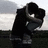 Two pixelated figures in dark hooded cloaks stand side-by-side against a muted background with overlaid text.