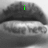 A grayscale close-up of lips with green pixelated text appearing sequentially: 'i', then 'love', then 'tyler' over the mouth area.