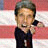 Static 48x48 pixel icon showing a person in dark clothing with short hair against a red and white striped background, rendered with heavy pixelation and dithering effects.