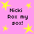 Pink background with yellow star shapes and repeated black text reading "Nicki Rox my sox!" in a pattern