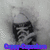Pixelated grayscale image with dark abstract shapes and a blue-purple horizontal bar at the bottom.