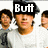 A pixelated image of a person wearing a dark cap and white shirt with text overlays reading "Butt" and "UGLY" in bold white letters on black backgrounds.