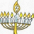 A pixelated menorah with nine lit candles on a white background, next to a yellow with black text reading "Happy Chanukkah"