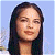 A 50x50 pixel buddy icon split into two sections: a left-side portrait of a woman with long dark hair against a light blue background, and a right-side green section with bright green text reading "Original Icons .com".