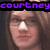 A four- shows a person with light brown hair and glasses; text overlays change