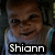 Pixelated image of a person with brown hair wearing a light blue shirt, smiling against a dark background with text reading 'Shiann' at the bottom.