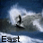 Animated sequence showing a surfer riding a wave with text labels 'East', 'Coast', 'Surfers', and 'Rule' below the frames.