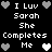 Black background with white pixelated text and heart symbols arranged in a pattern, showing repeated phrases and alternating heart colors