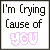A 3x3 contact sheet of seven animated frames showing a text-based buddy icon with changing blue vertical dots around the phrase 'I'm Crying Cause of you' in black and pink pixelated fonts on white background.