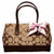 A brown patterned handbag with a pink bow, a pink Coach tag, and a colorful repeating logo background.