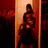 Four distinct pixelated scenes show people in various poses: a figure holding an object against red and orange background, two women with one taking a photo, a couple embracing near a mirror, and another pair kissing.
