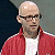 A pixelated contact sheet showing two frames of an animated buddy icon with a person in a red jacket and green text reading "Original Icons .com" on the right side.