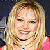 A pixelated image of a smiling person with long blonde hair wearing a pink top, with blue text reading 'Hilary Duff' overlaid on the right side.