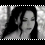 Black-and-white animated contact sheet of a woman with long dark hair in four frames showing subtle facial expression changes against a blurred background.