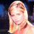 A pixelated contact sheet showing two frames of an animated buddy icon with a woman on the left and green text logo on the right against dark background.